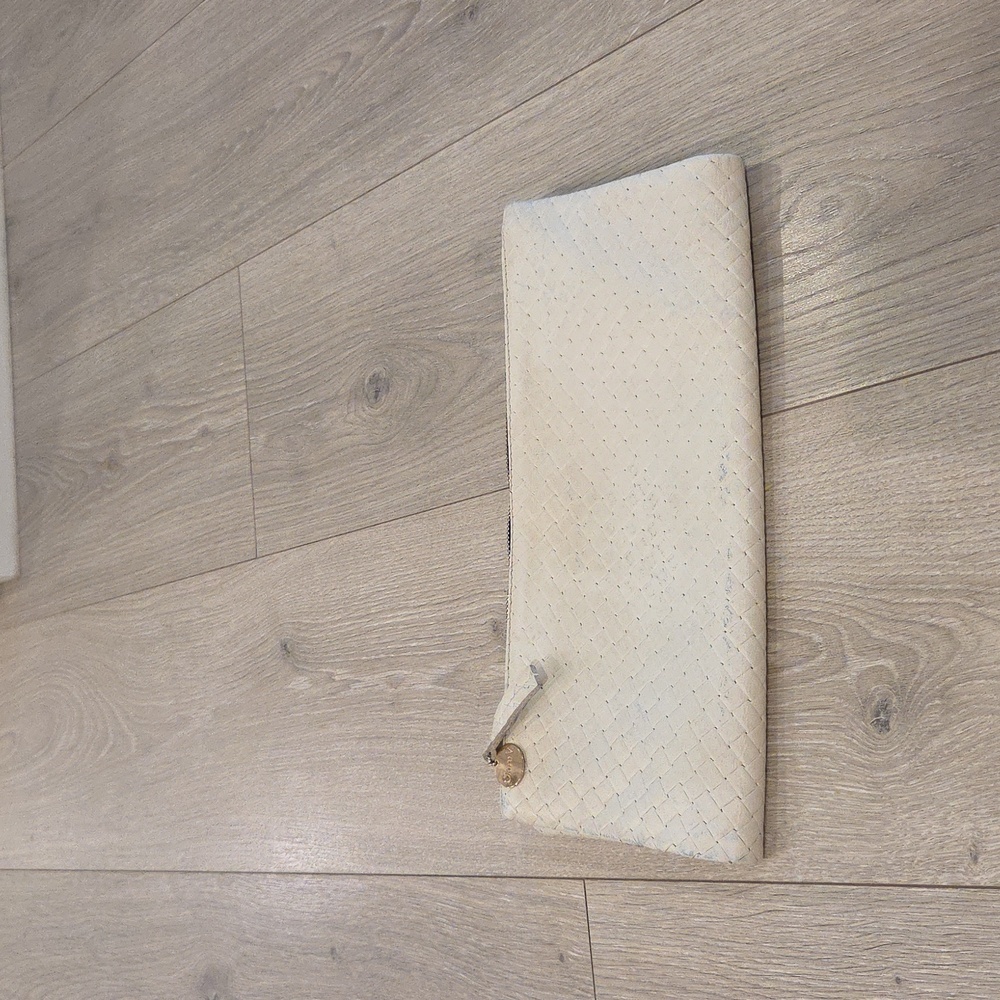Claire V.  Woven Foldover Clutch